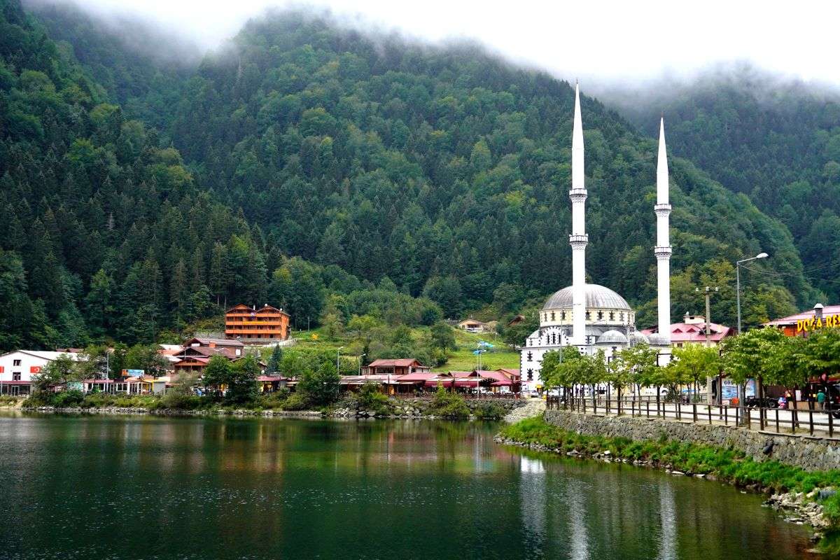 Uzungöl lake and its lakeside mosque surrounded by green mountains